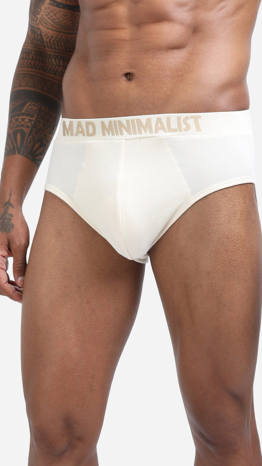 Fit-guide illustration showing correct waist and leg fit of cotton briefs on a male model