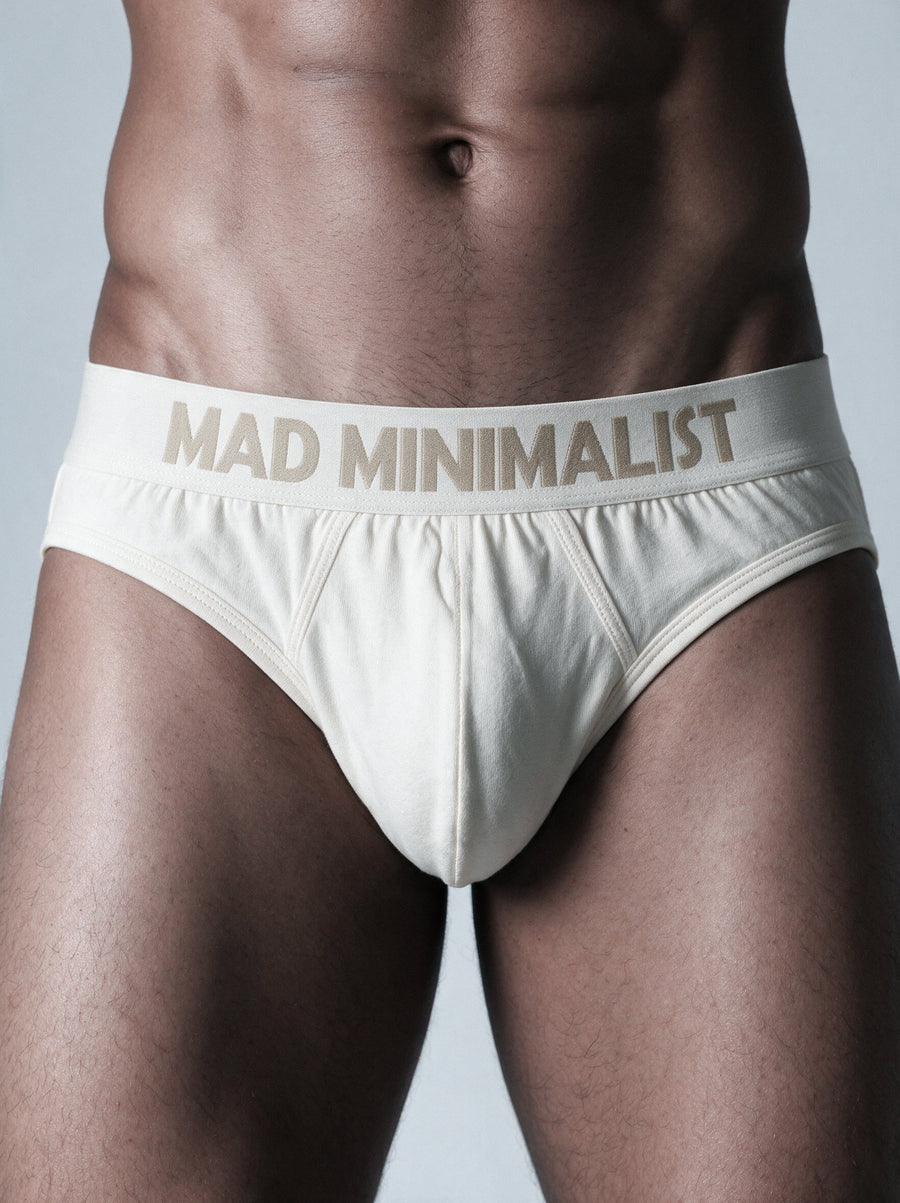 Split image contrasting dyed regular cotton and un-dyed organic cotton underwear