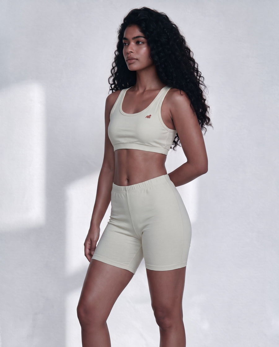 Woman measuring her hips with a soft tape to choose the right size of cotton boy shorts