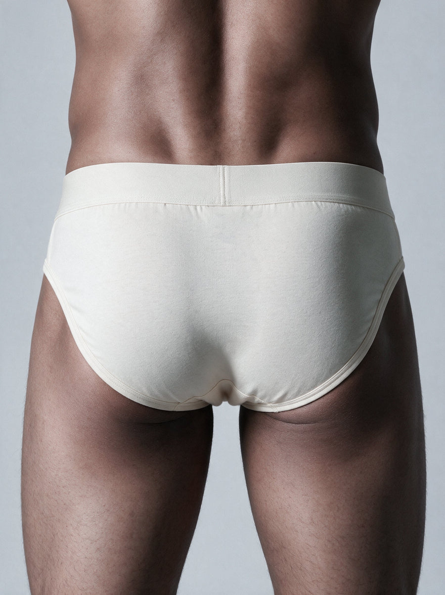 Man mid-workout wearing breathable long-leg cotton boxer briefs
