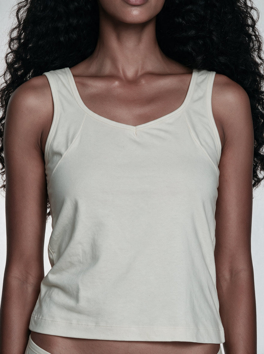 Three outfit looks styled with an undyed organic cotton camisole